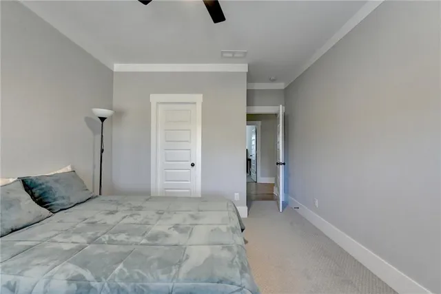 a view of a bedroom with cabinet cabinet and a bathroom