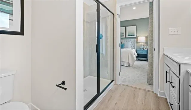 a view of a bathroom from the hallway