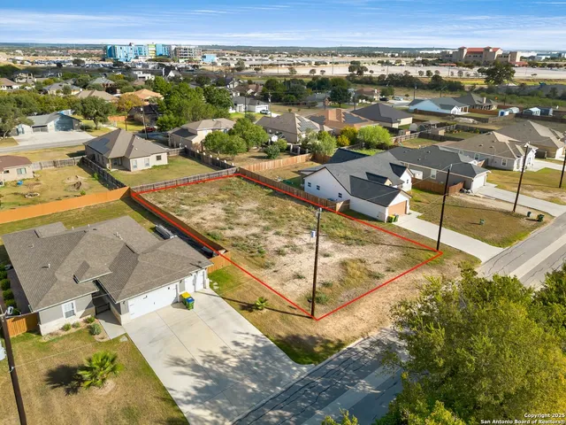 an aerial view of a residential building
