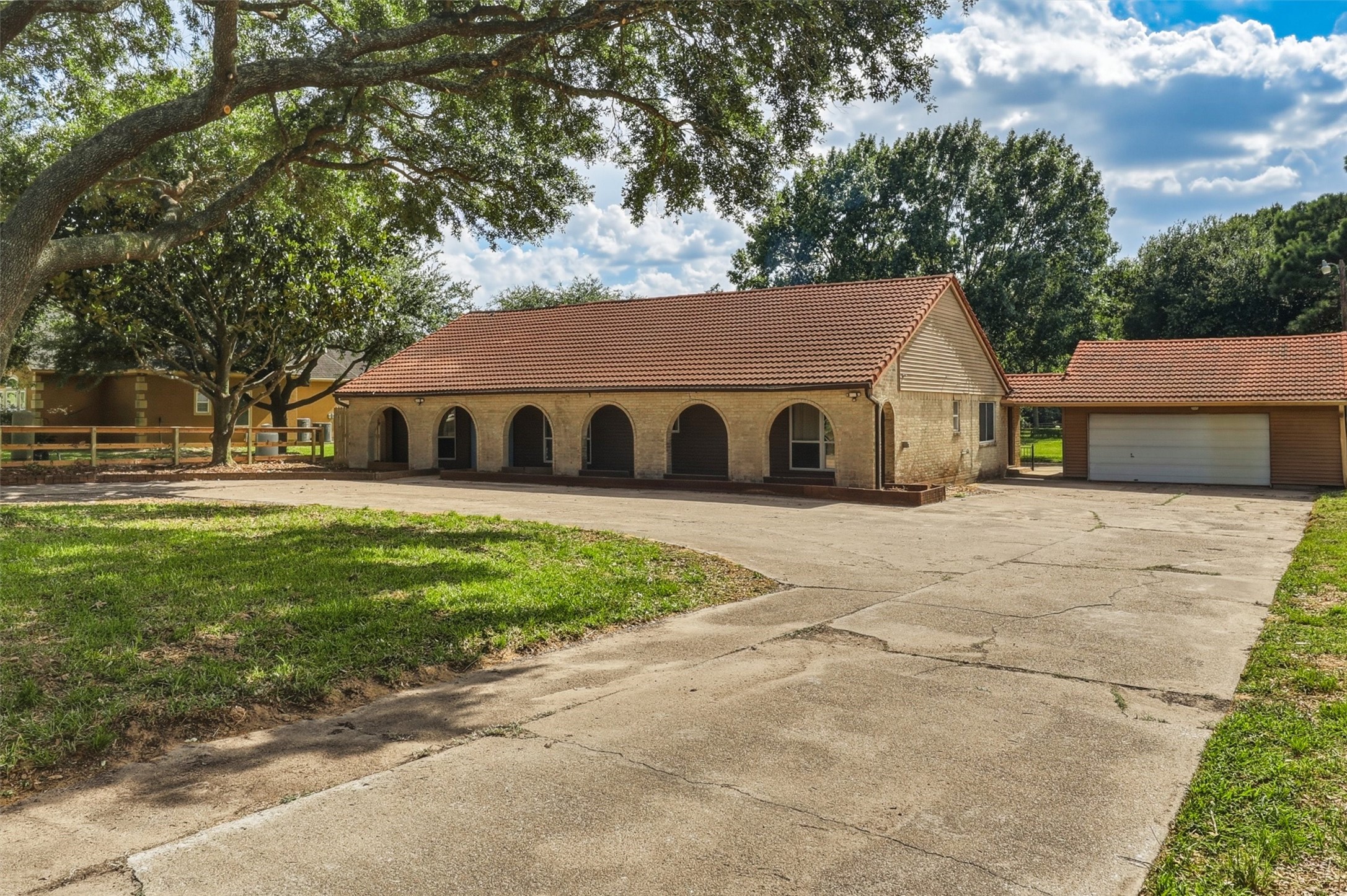 22923 Tomball Cemetery Road Tomball, TX 77377 - Photo 4 of 50 This unrestricted one acre home and property has an oversized garage and large workshop attached.