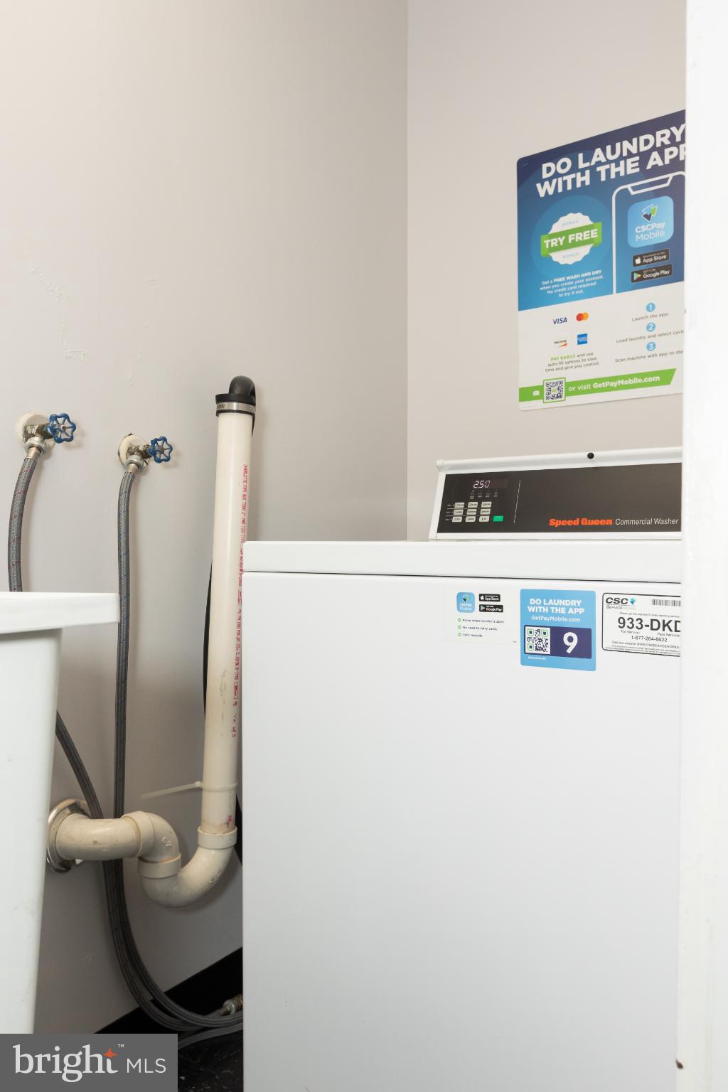 1 East Chase Street, Unit 712 Baltimore, MD 21202 - Photo 41 of 49 Modern laundry space with convenient app access.