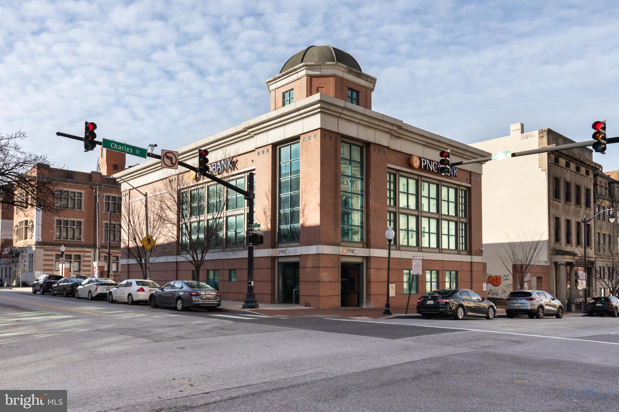 1 East Chase Street, Unit 712 Baltimore, MD 21202 - Photo 46 of 49 Modern bank building in urban setting.