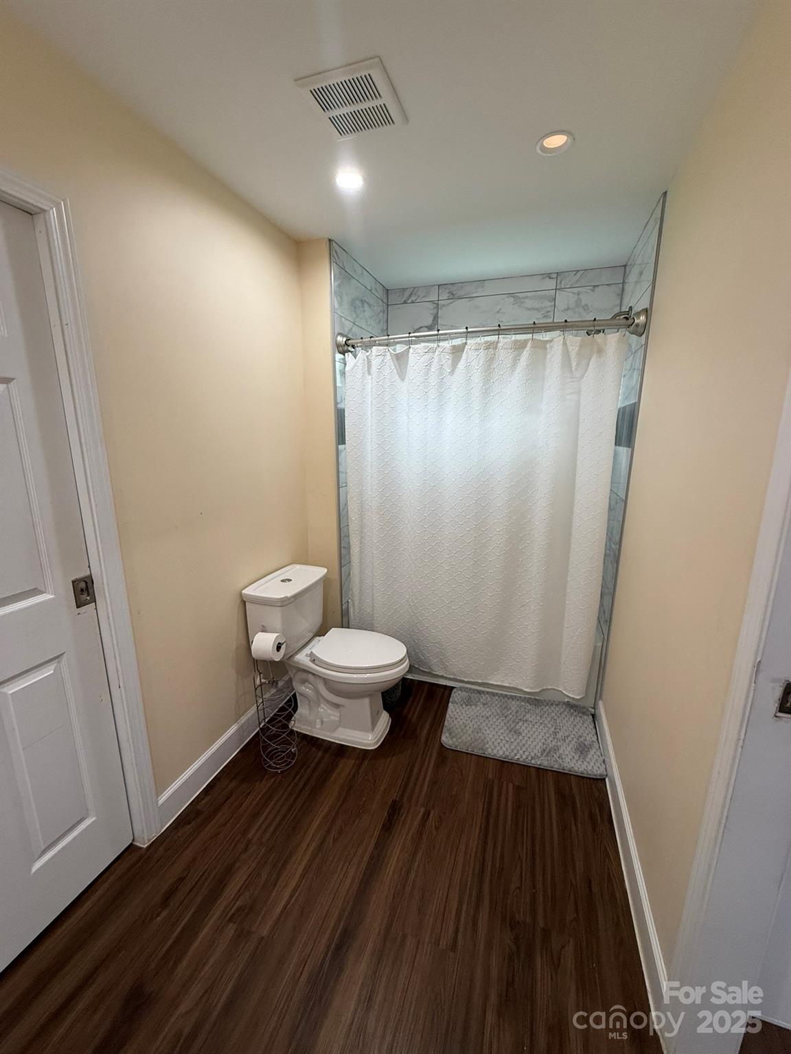 10116 Robert Bost Road Midland, NC 28107 - Photo 16 of 32 a bathroom with a sink and a toilet
