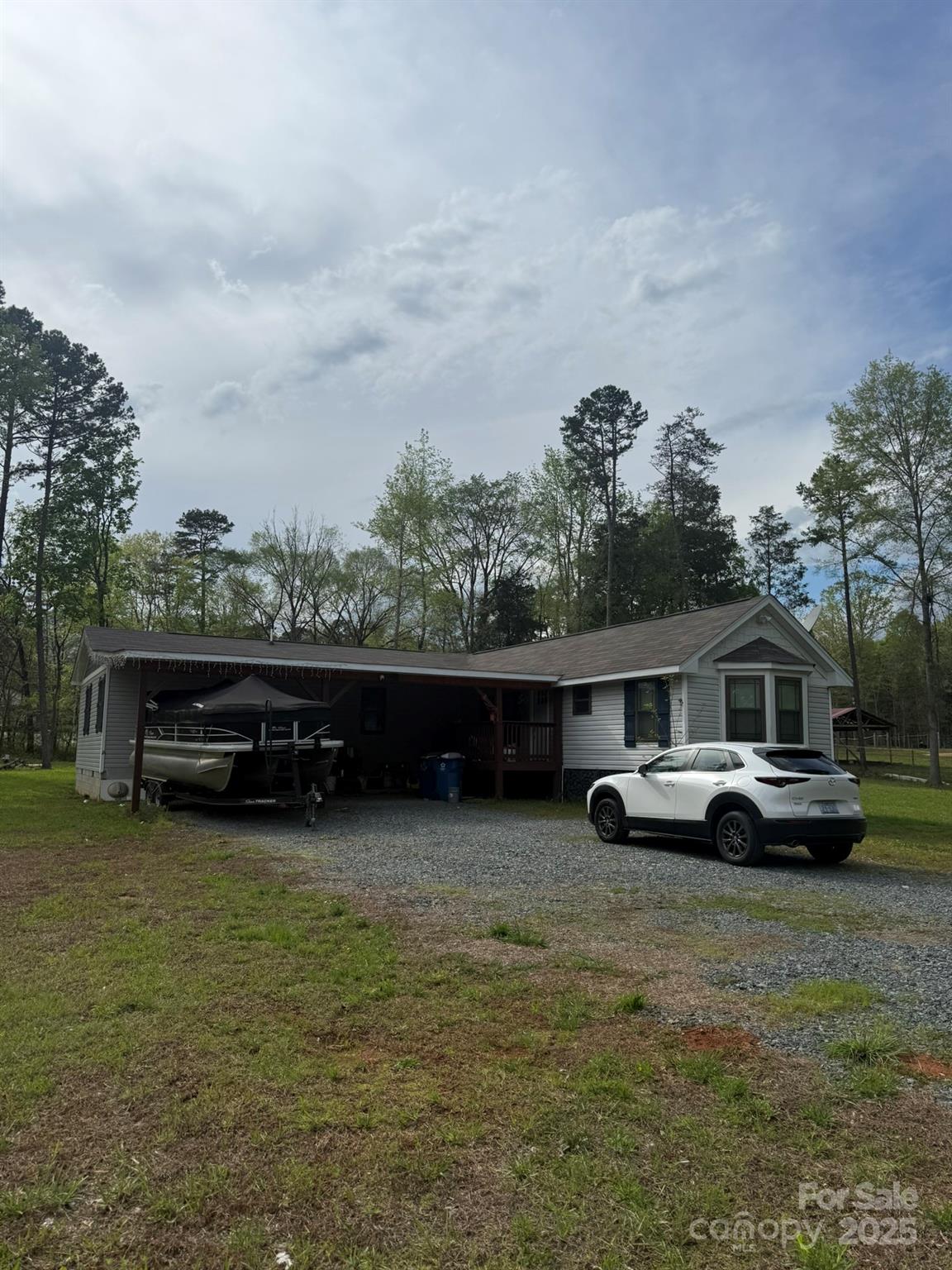 10116 Robert Bost Road Midland, NC 28107 - Photo 20 of 32 a view of house with yard and entertaining space