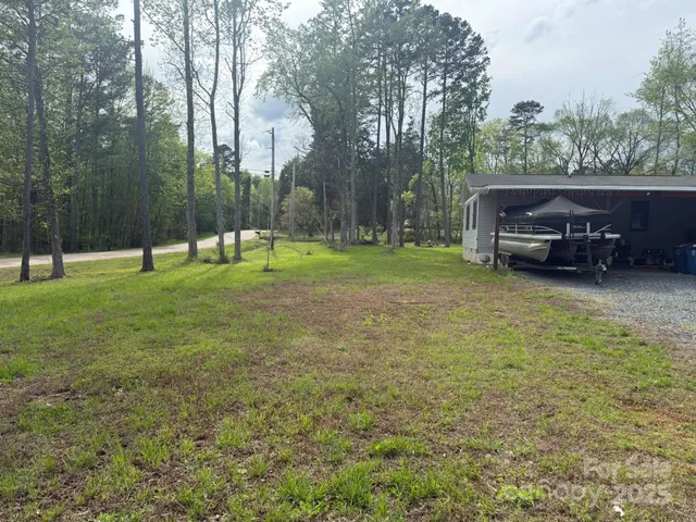 a view of a park with large trees