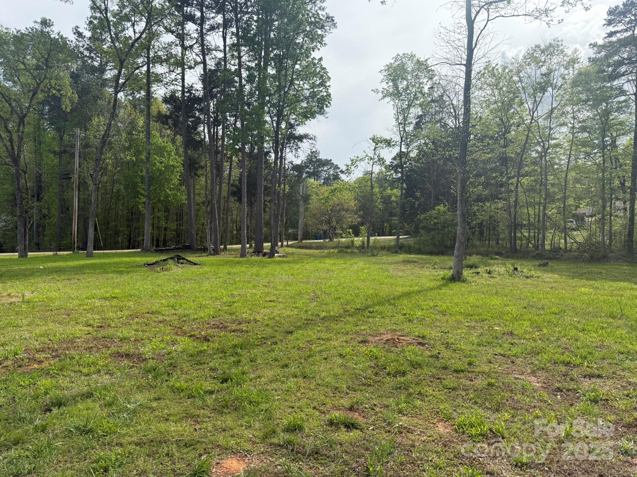 10116 Robert Bost Road Midland, NC 28107 - Photo 26 of 32 a view of outdoor space with deck and yard