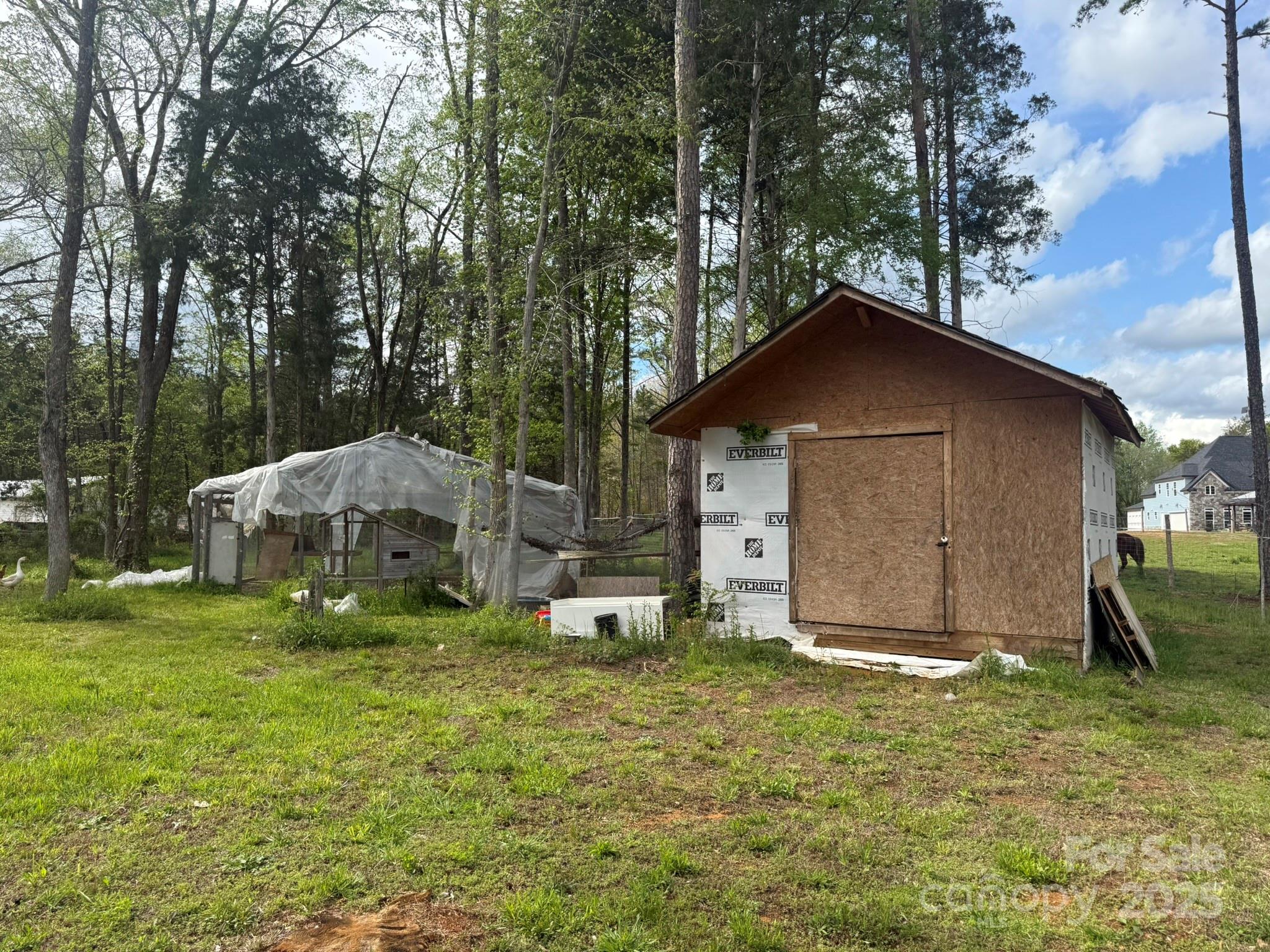 10116 Robert Bost Road Midland, NC 28107 - Photo 28 of 32 a house view with a outdoor space