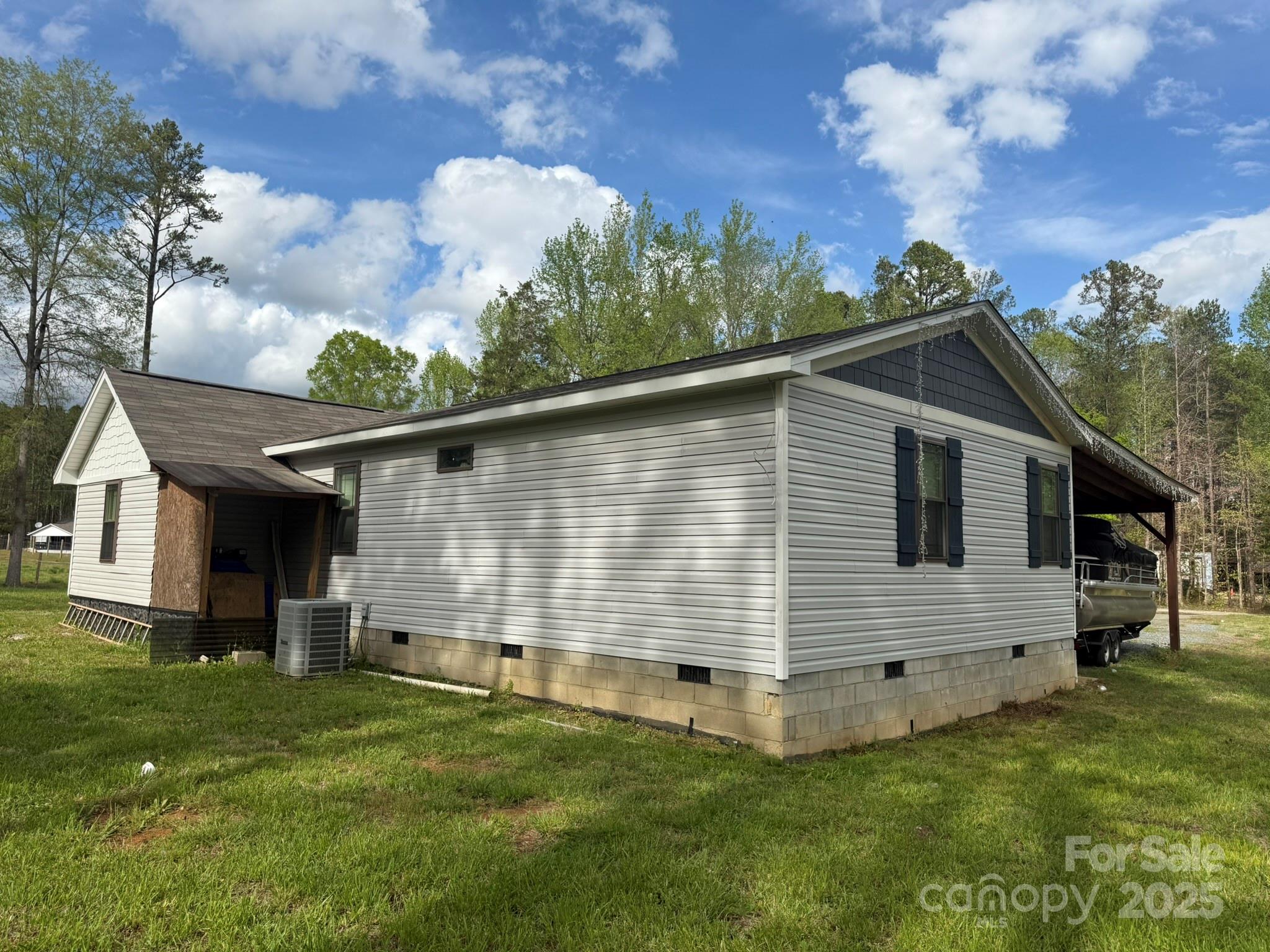 10116 Robert Bost Road Midland, NC 28107 - Photo 31 of 32 a view of house with backyard