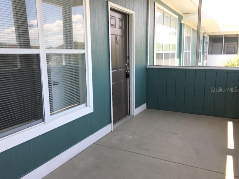 4802 51st Street West, Unit 1418 Bradenton, FL 34210 - Photo 12 of 20 a view of an empty room with a window