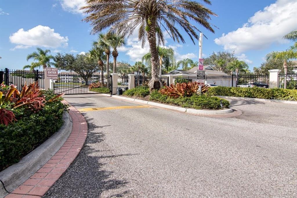 4802 51st Street West, Unit 1418 Bradenton, FL 34210 - Photo 20 of 20 a view of a street with a building in the background