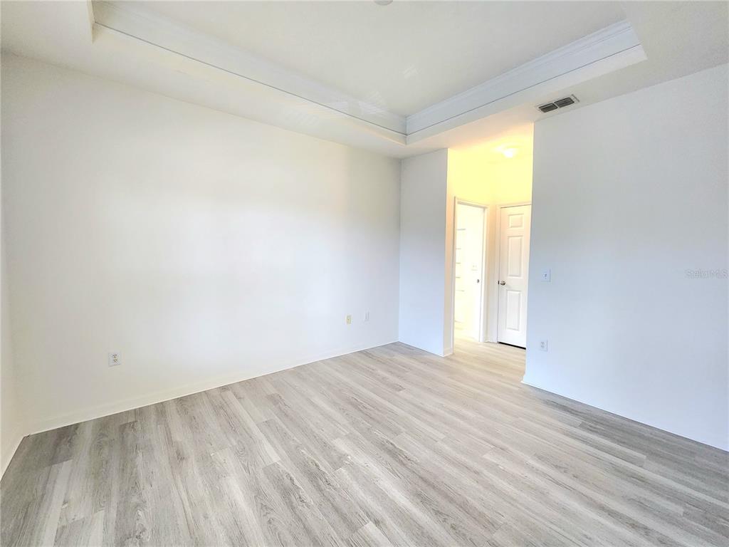 4802 51st Street West, Unit 1418 Bradenton, FL 34210 - Photo 8 of 20 a view of an empty room and window