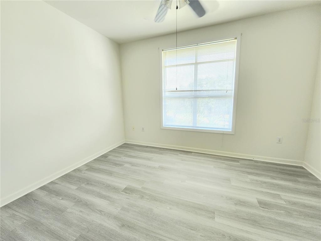 4802 51st Street West, Unit 1418 Bradenton, FL 34210 - Photo 10 of 20 an empty room with a window