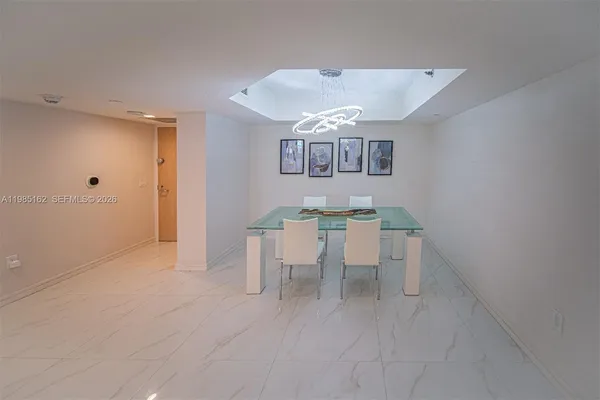 a view of a dining room with furniture
