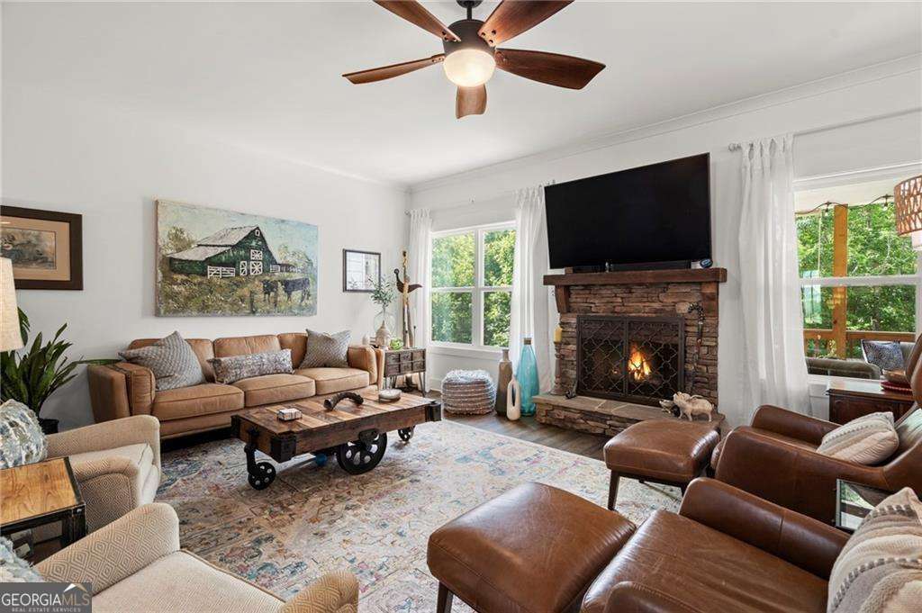 175 STONELEDGE Trace North Jasper, GA 30143 - Photo 12 of 31 a living room with furniture fireplace and a large window