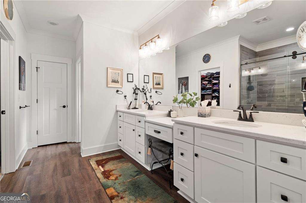 175 STONELEDGE Trace North Jasper, GA 30143 - Photo 16 of 31 a spacious bathroom with double sink and a mirror