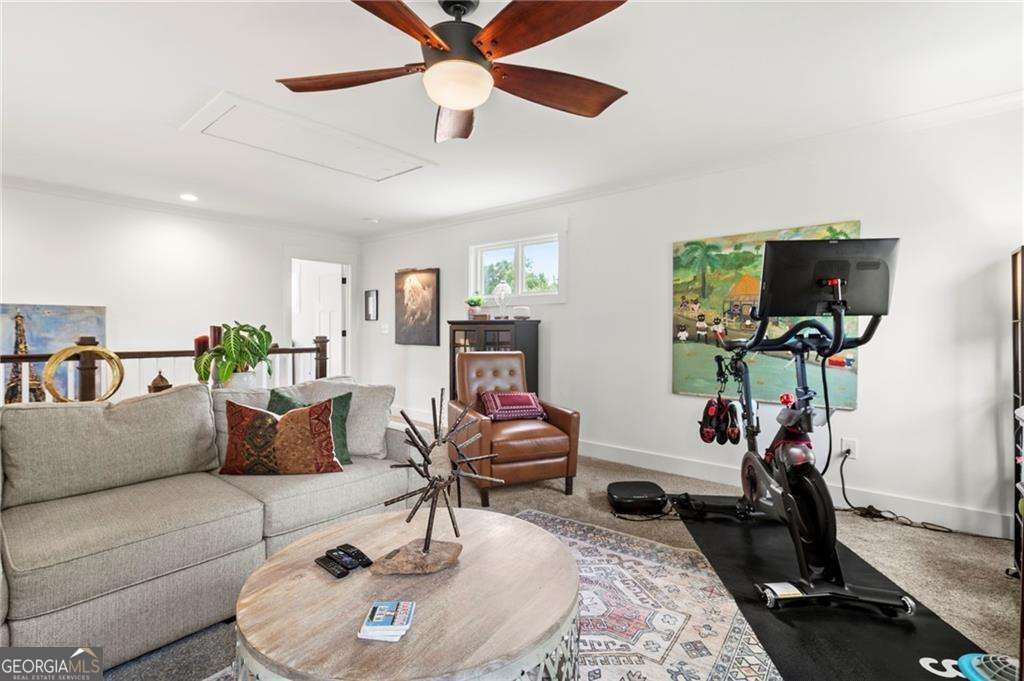 175 STONELEDGE Trace North Jasper, GA 30143 - Photo 19 of 31 a living room with furniture and a flat screen tv