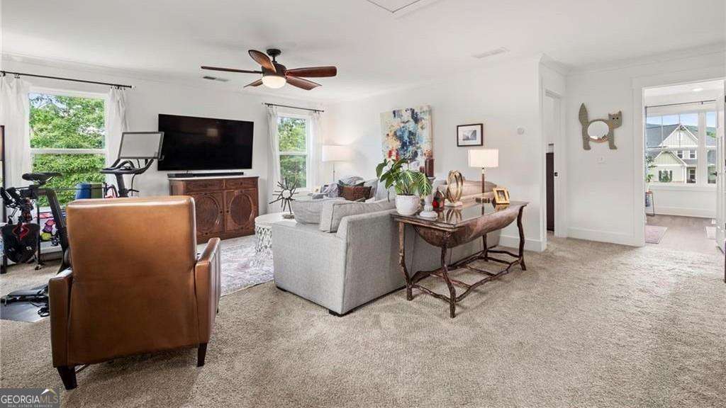 175 STONELEDGE Trace North Jasper, GA 30143 - Photo 20 of 31 a living room with furniture a flat screen tv and a window