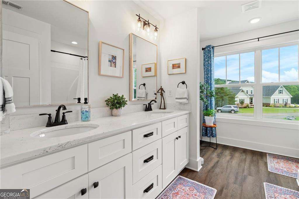 175 STONELEDGE Trace North Jasper, GA 30143 - Photo 22 of 31 a bathroom with a granite countertop sink mirror and a bathtub