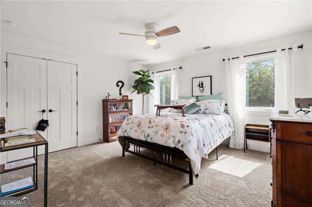 175 STONELEDGE Trace North Jasper, GA 30143 - Photo 24 of 31 a bed room with a bed and a window