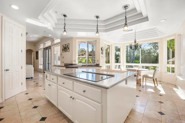 a spacious bedroom with a bed and a fireplace