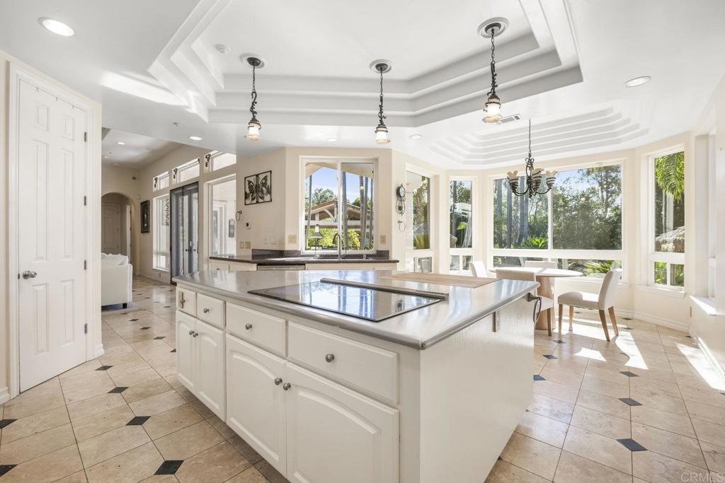 15615 Boulder Ridge Lane Poway, CA 92064 - Photo 14 of 75 a large white kitchen with a large window