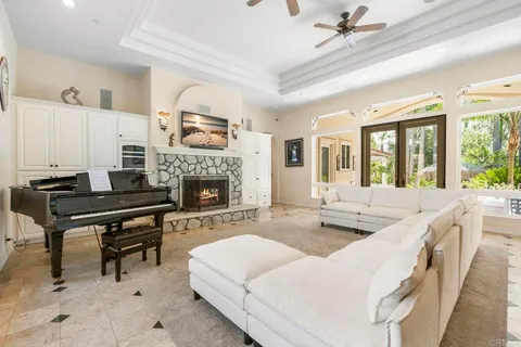 a bedroom with a large bed and a large window