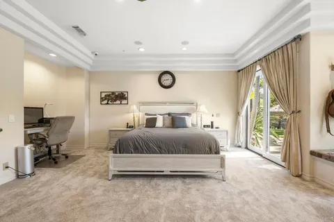 a spacious bathroom with a granite countertop sink a mirror and a