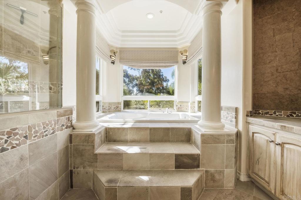 15615 Boulder Ridge Lane Poway, CA 92064 - Photo 25 of 75 a view of bathroom with bathtub and window