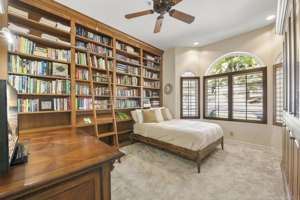 15615 Boulder Ridge Lane Poway, CA 92064 - Photo 27 of 75 a spacious bedroom with a bed and a window