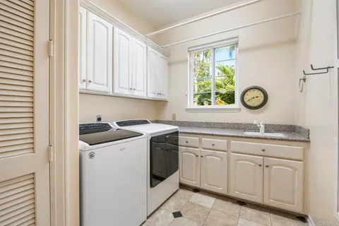 a view of a swimming pool with a yard