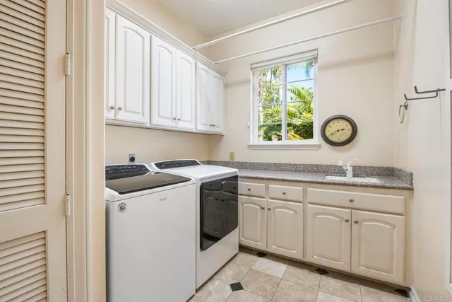 a view of a swimming pool with a yard