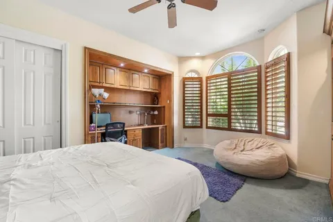 a kitchen with sink cabinets and outdoor seating