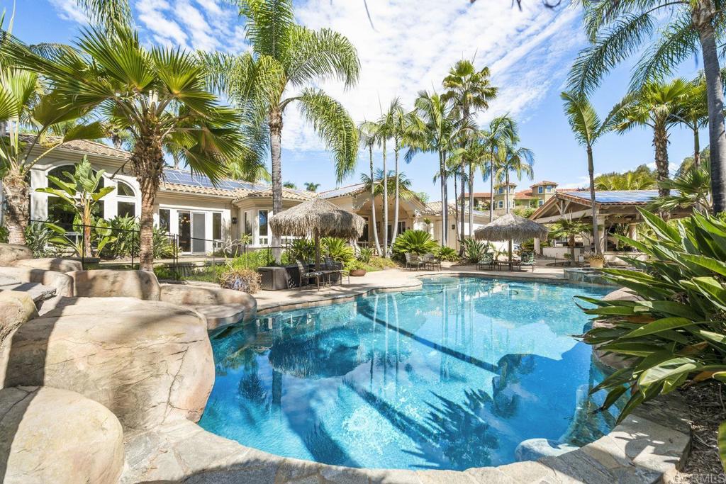 15615 Boulder Ridge Lane Poway, CA 92064 - Photo 37 of 75 a view of a swimming pool with a patio