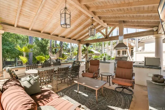 a view of a swimming pool with a patio