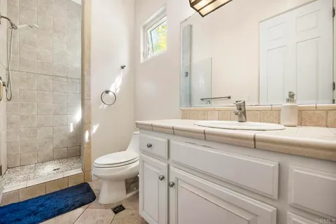 a view of a mountain range in a cloudy sky