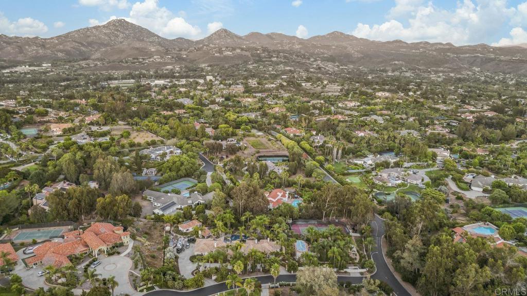 15615 Boulder Ridge Lane Poway, CA 92064 - Photo 75 of 75 a view of a mountain range in a cloudy sky