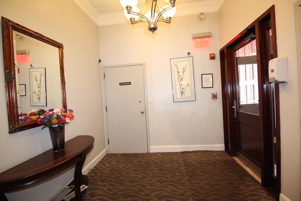 3 Appleton Street, Unit 502 Boston, MA 02116 - Photo 12 of 14 a view of a hallway and a livingroom with furniture