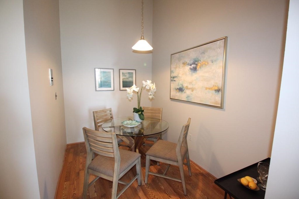 3 Appleton Street, Unit 502 Boston, MA 02116 - Photo 7 of 14 a dining room with furniture and wooden floor