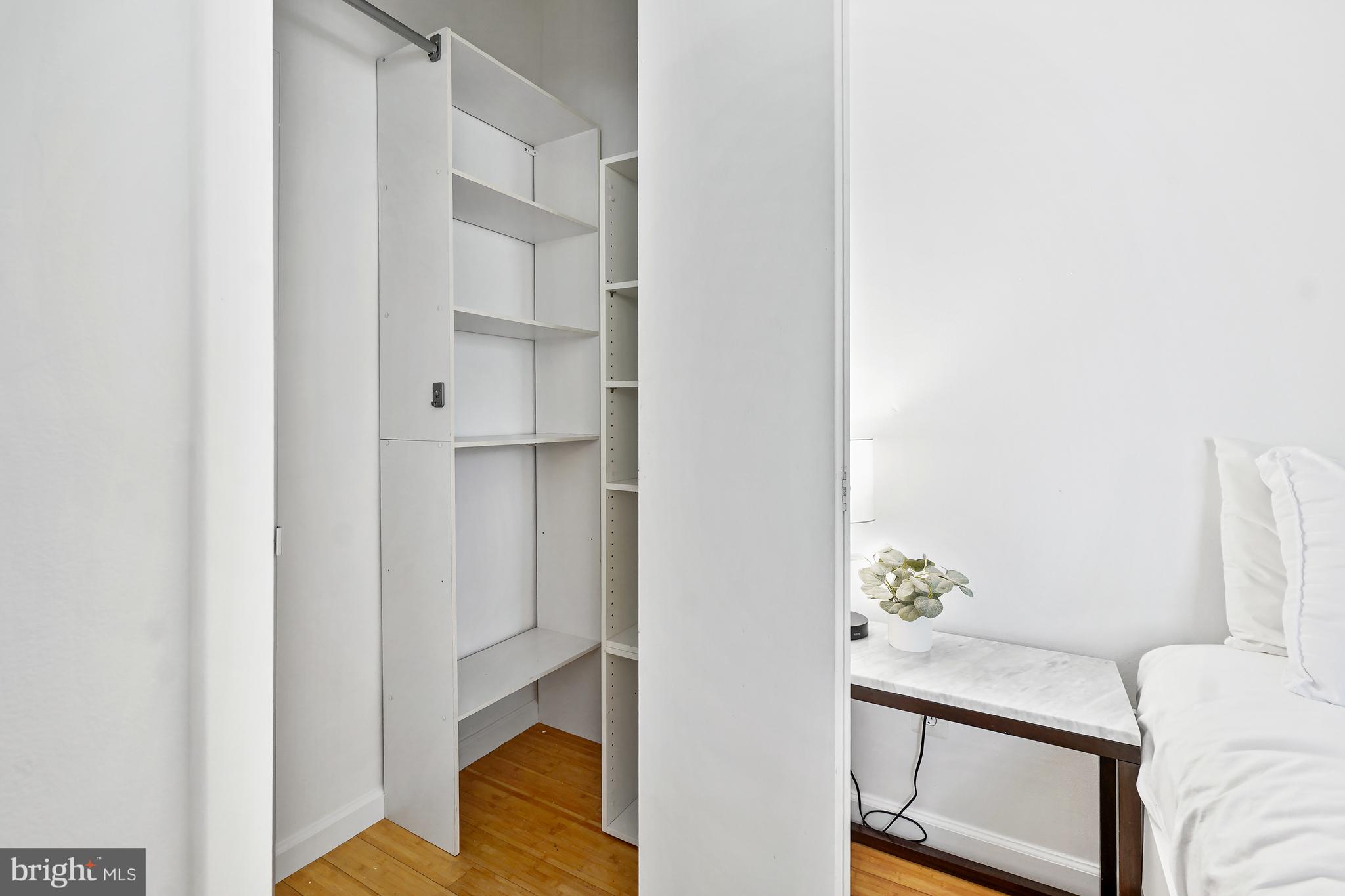1822 15th Street Northwest, Unit 303 Washington, DC 20009 - Photo 13 of 22 a view of hallway with furniture and wooden floor