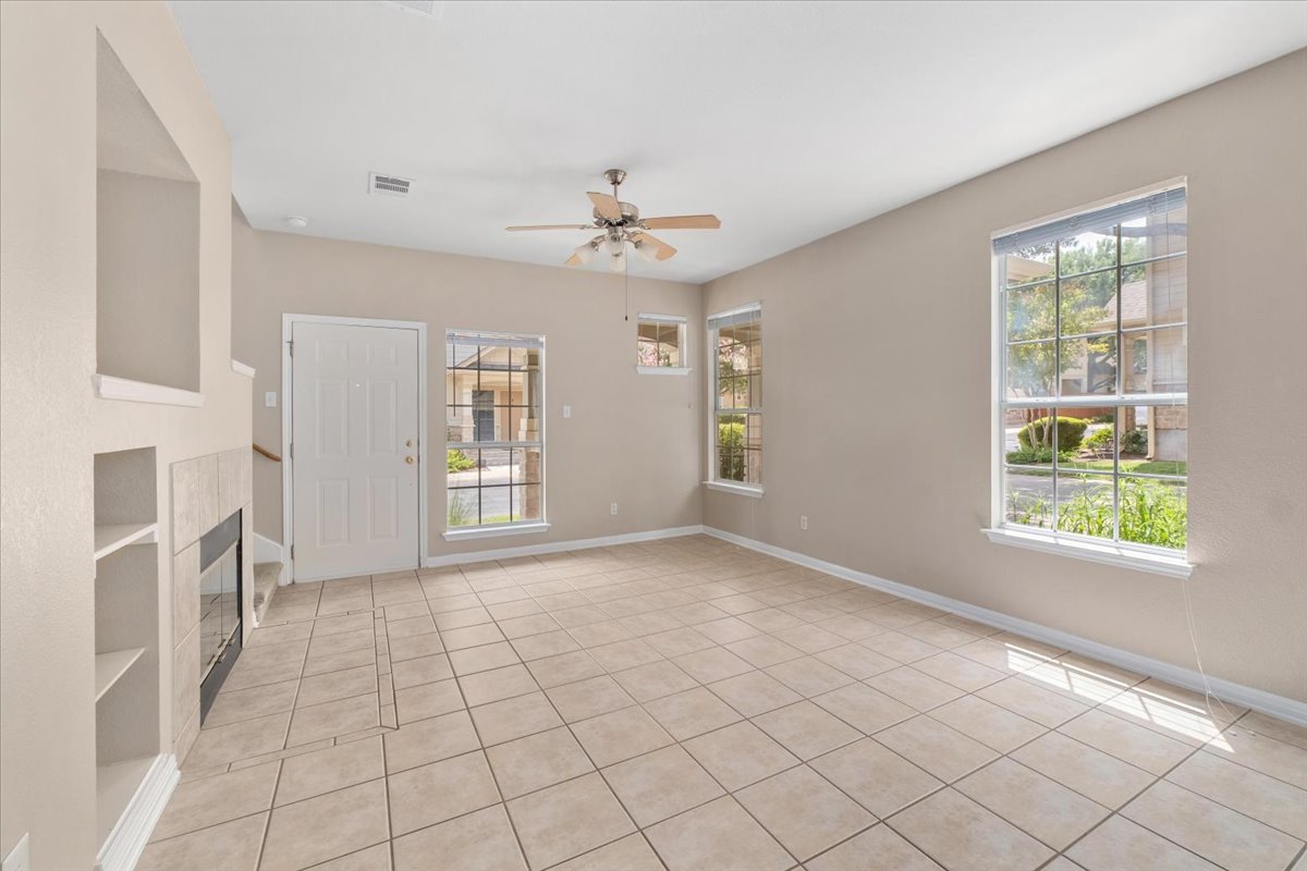 11000 Anderson Mill Road, Unit 11 Austin, TX 78750 - Photo 4 of 34 A spacious living area with abundant natural light, offering a welcoming atmosphere.