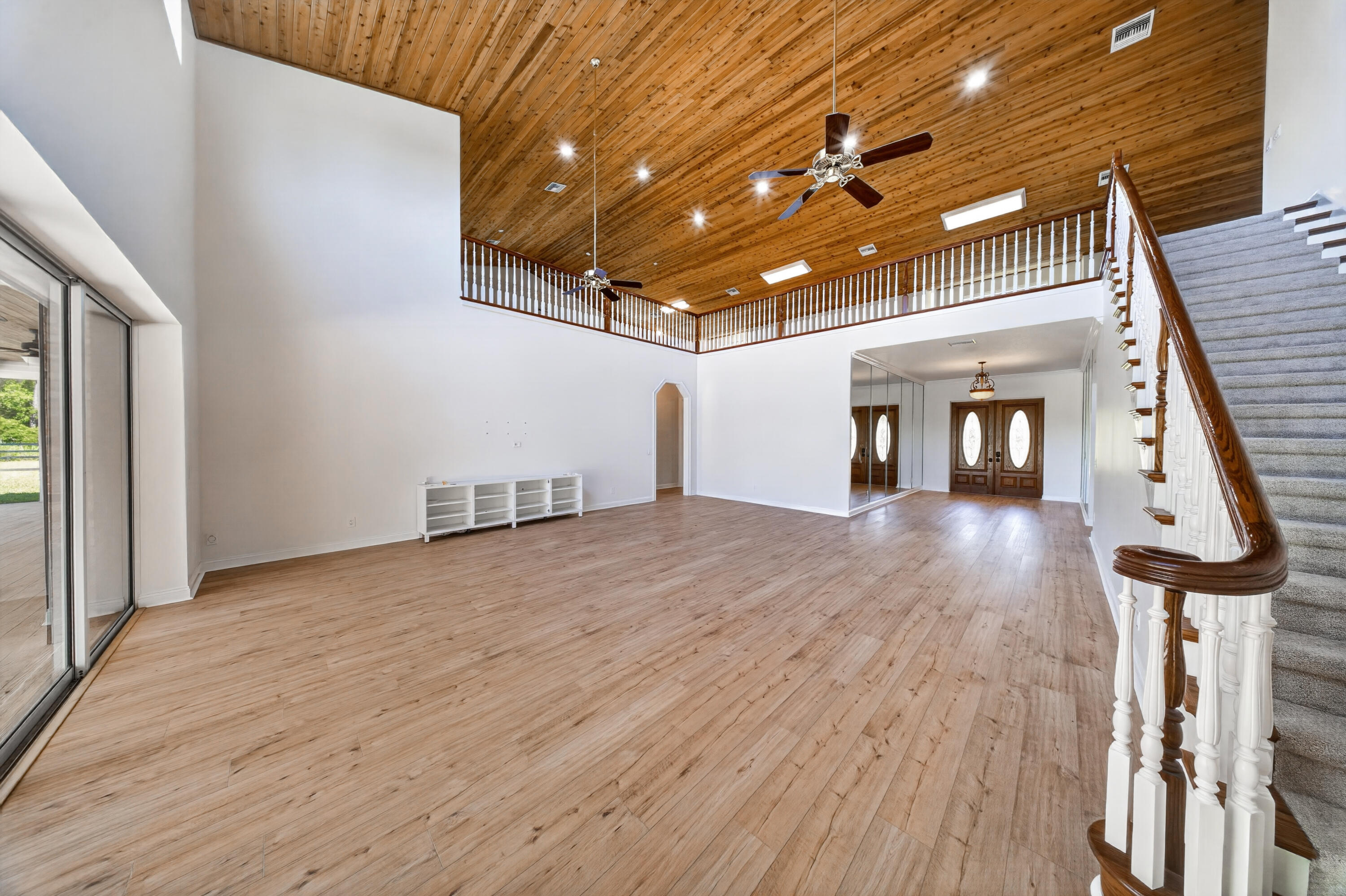 8686 Andrews Avenue Fort Pierce, FL 34945 - Photo 39 of 76 a view of a room with wooden floor
