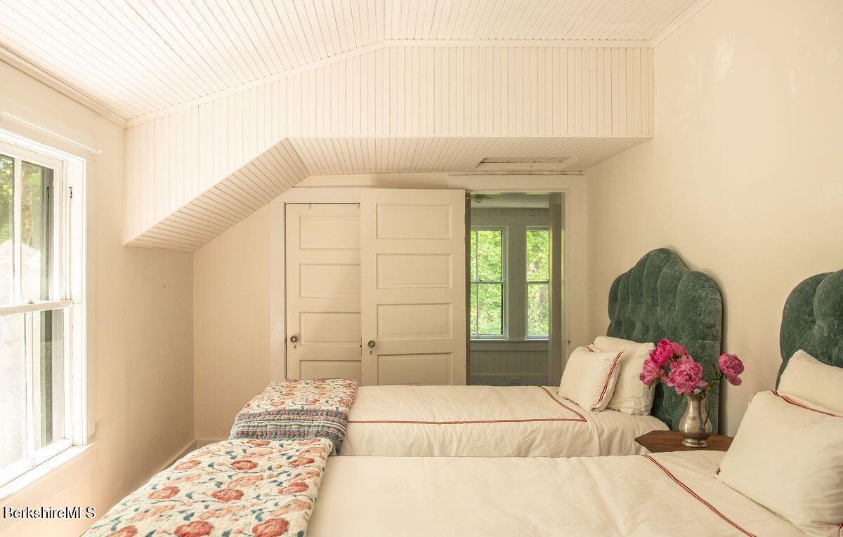 9 Yale Hill Road Stockbridge, MA 01262 - Photo 18 of 29 a bedroom with a bed and a window