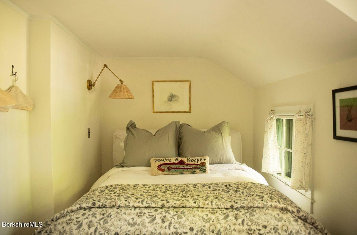 9 Yale Hill Road Stockbridge, MA 01262 - Photo 20 of 29 a bedroom with a bed and wooden floor