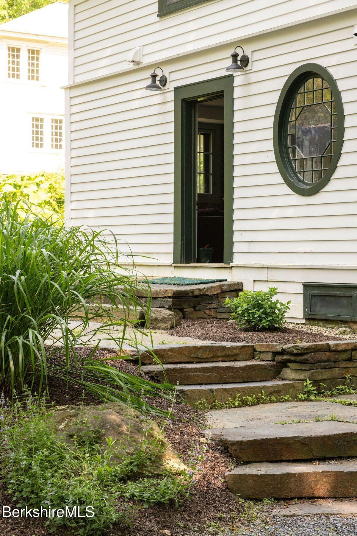 9 Yale Hill Road Stockbridge, MA 01262 - Photo 2 of 29 a view of a house with a small yard and a large window