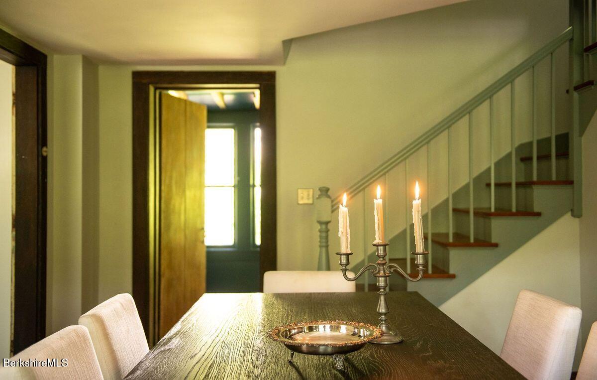 9 Yale Hill Road Stockbridge, MA 01262 - Photo 21 of 29 a living room with furniture and a dining table