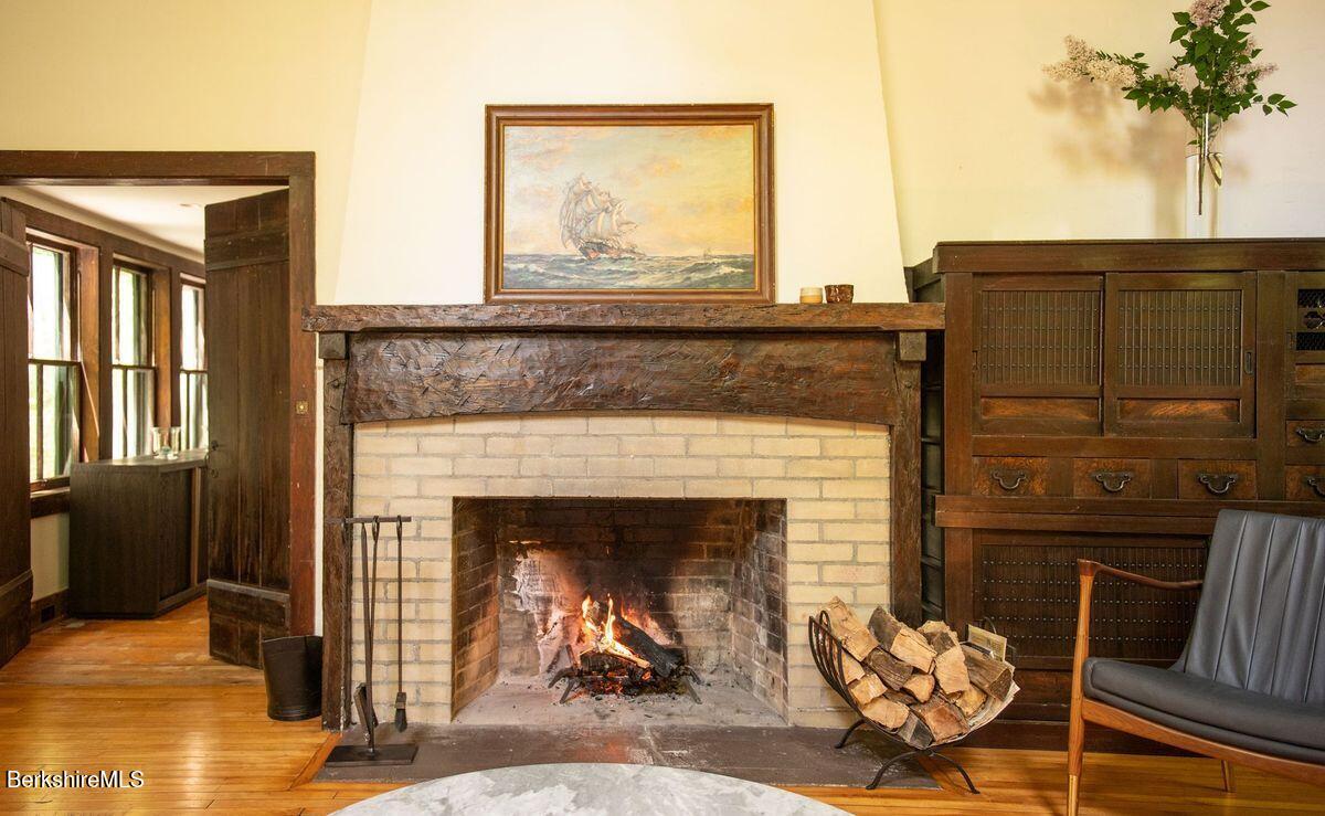 9 Yale Hill Road Stockbridge, MA 01262 - Photo 23 of 29 a living room with furniture and a fireplace