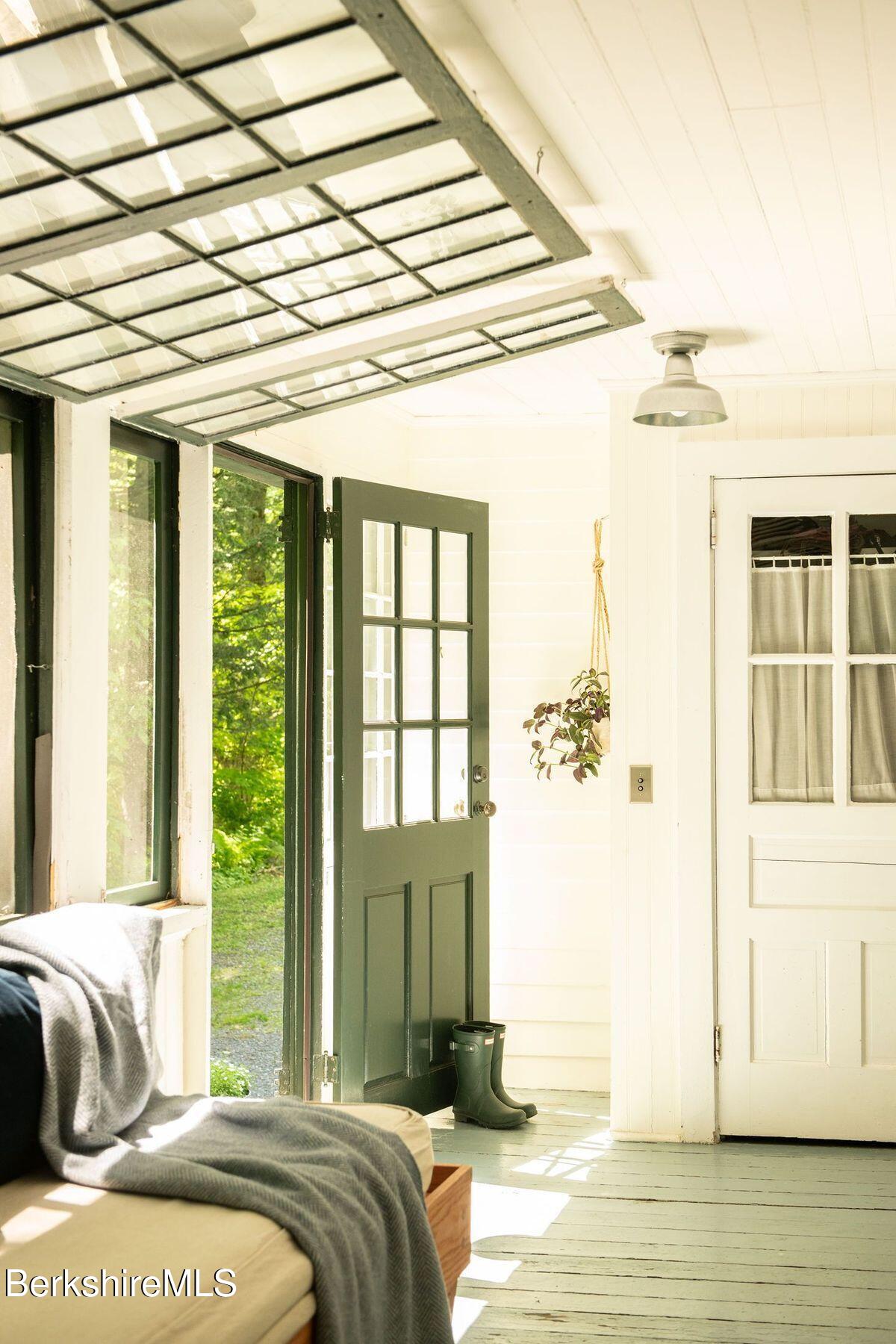 9 Yale Hill Road Stockbridge, MA 01262 - Photo 3 of 29 a bedroom with a bed and a window