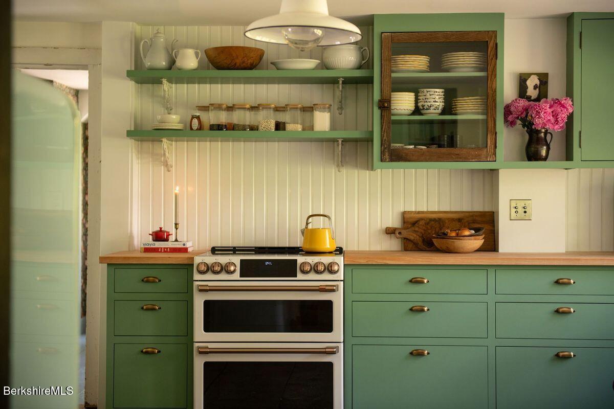 9 Yale Hill Road Stockbridge, MA 01262 - Photo 5 of 29 a kitchen with a stove and cabinets