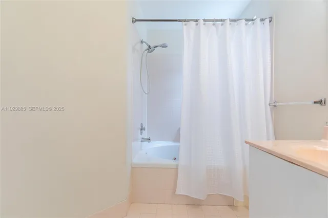 a view of a hallway with front door