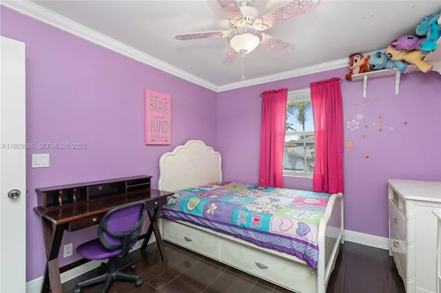 a view of a hallway with wooden floor and living room